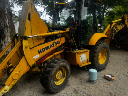 Backhoe ac recharging