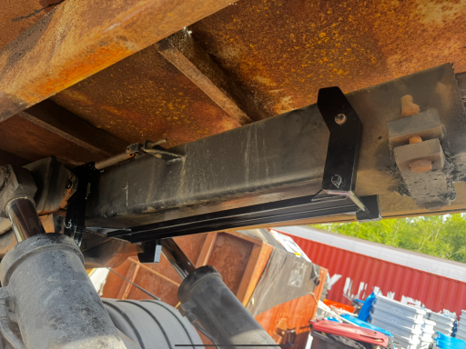 Custom bracket made for a roll off dumpster truck